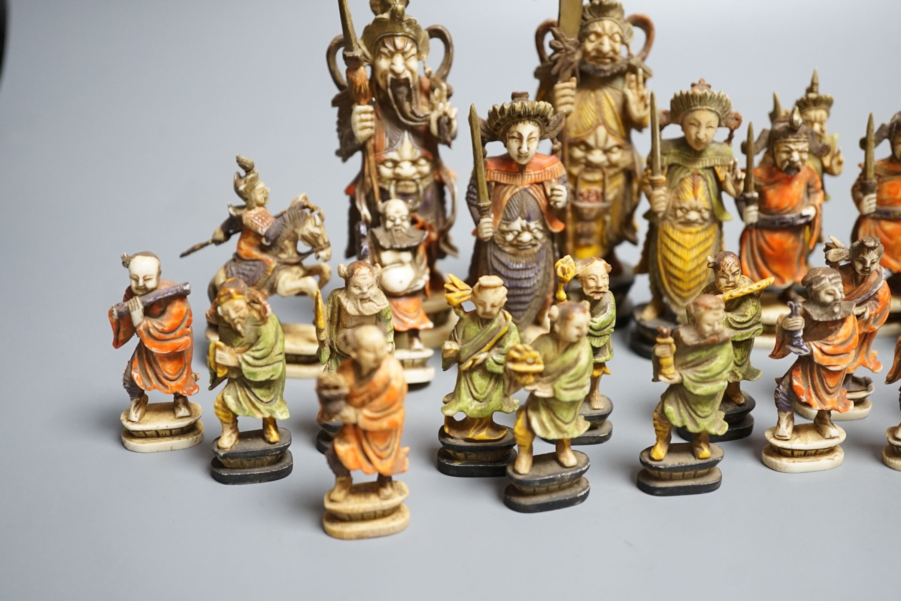 An early 20th century south East Asian stained ivory chess set